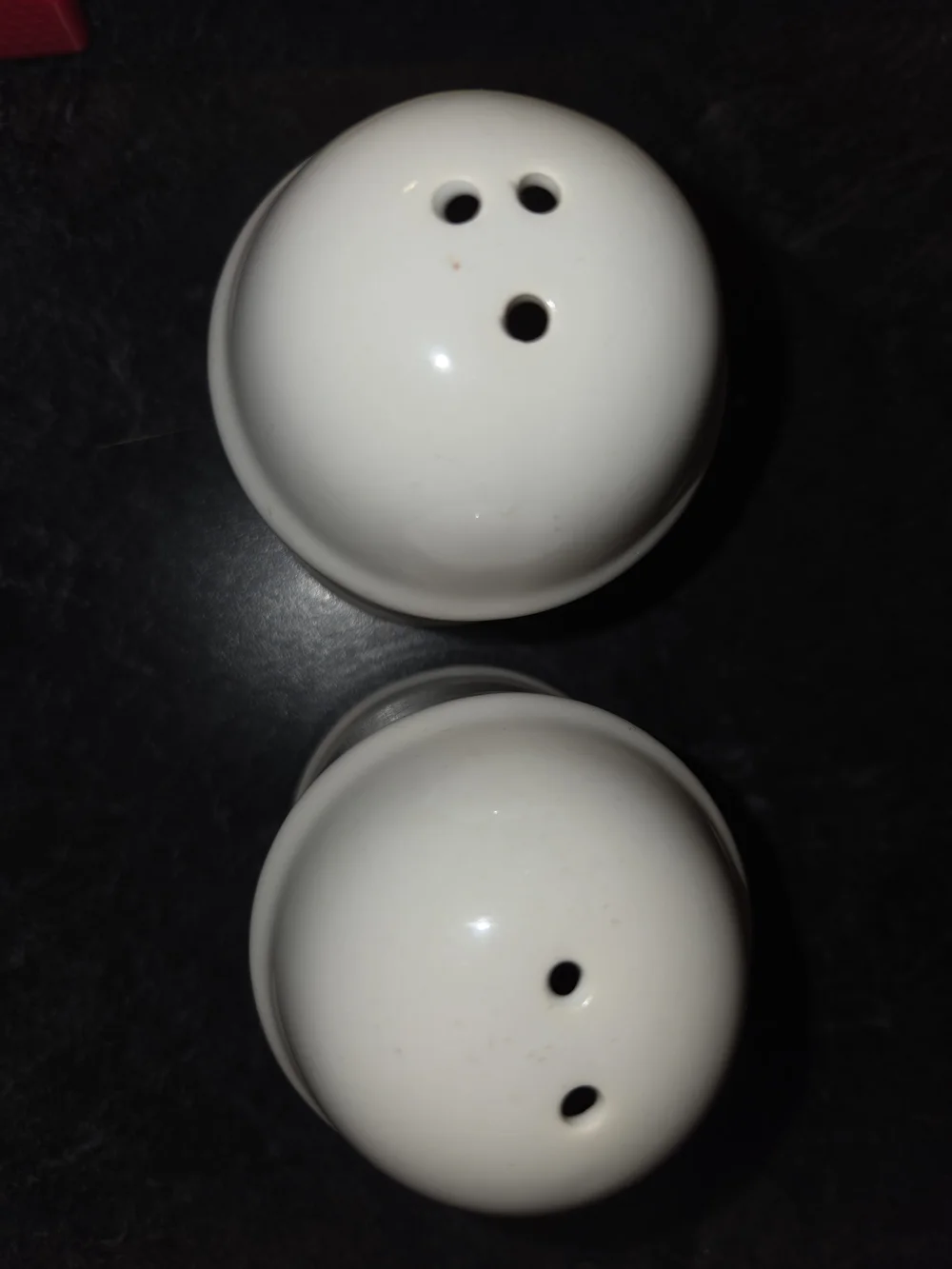 White Ceramic Salt & Pepper Shakers with Cow Heart Motif